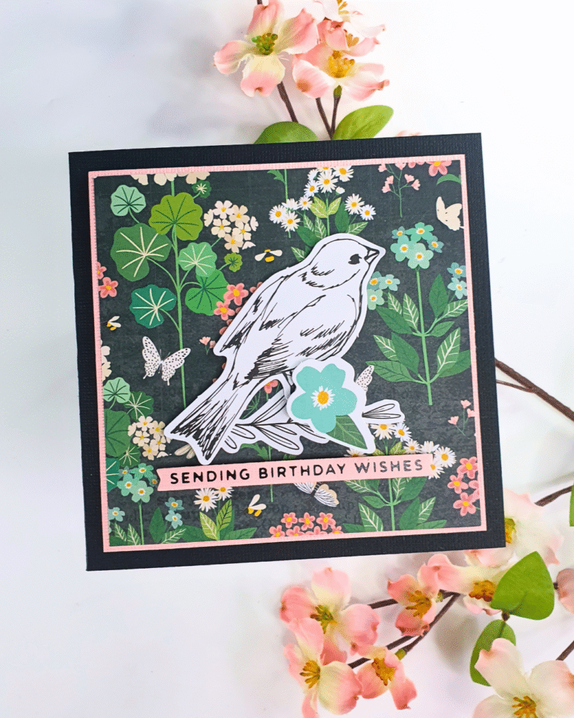 Handmade Card created by pairing patterned paper and ephemera using the Hello It's Me collection from Rosie's Studio