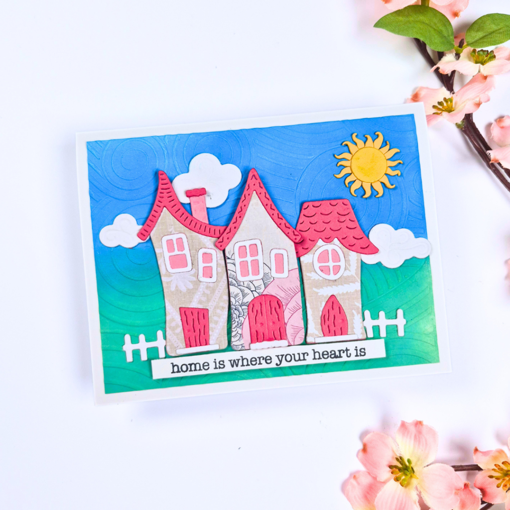 Handmade Card created using scraps of patterned paper and the Whimsical Village Dies from Spellbinders