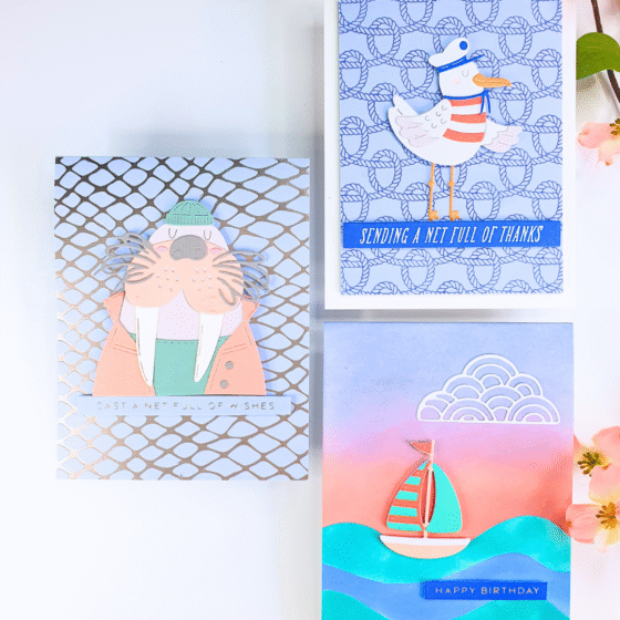 Handmade Sea-themed card showing how to create beautiful backgrounds using the June 2025 clubs from Spellbinders