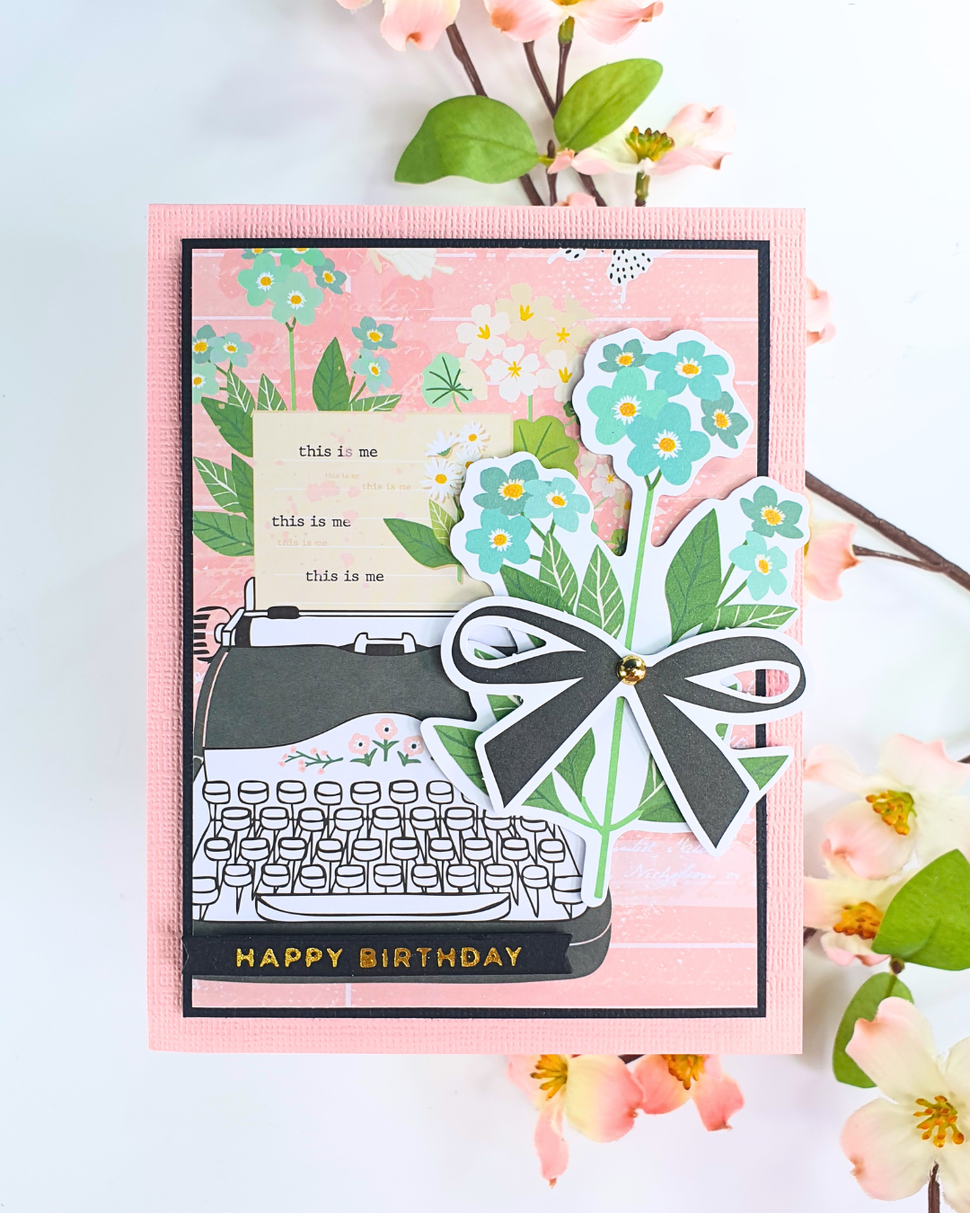 Handmade Card created by pairing patterned paper and ephemera using the Hello It's Me collection from Rosie's Studio